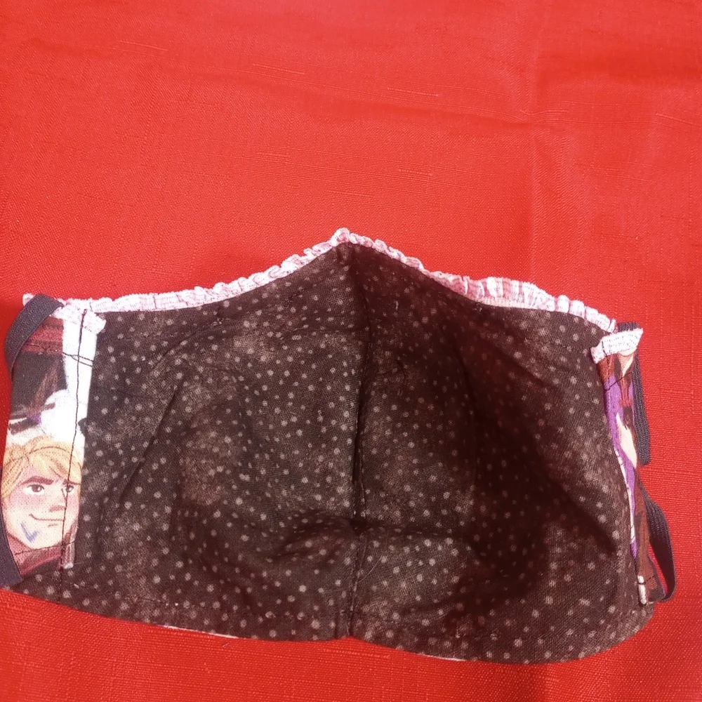 SKU 900KM Frozen Pattern With Studs, Adjustable Earpieces.